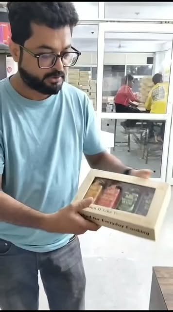 Printing Material team member presenting a finished gift set